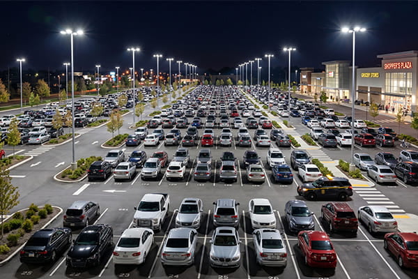 A brightly and uniformly lit parking lot at night
